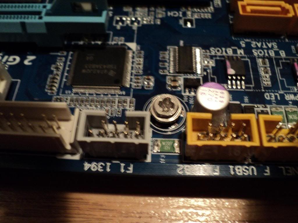 Screw stuck in Motherboard Standoff [HELP] G.SKILL TECH FORUM